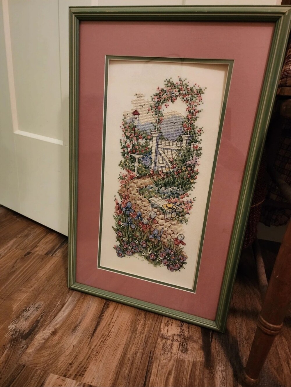 Framed hand made cross stitch garden scene